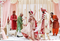 Indian couple walking around the wedding altar. Indian couple walking around the wedding altar.