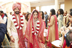 Indian couple walking out of the wedding ceremony. Indian couple walking out of the wedding ceremony.
