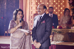 Indian relatives giving a speech for the married couple. Indian relatives giving a speech for the married couple.