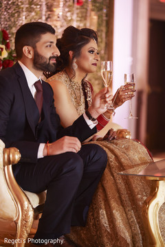Indian couple raising their cups. Indian couple raising their cups.