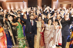 Indian couple and their guests saluting the camera. Indian couple and their guests saluting the camera.