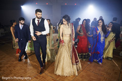 Indian couple performing during the reception party. Indian couple performing during the reception party.