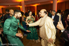 Indian groom dancing with relatives. Indian groom dancing with relatives.
