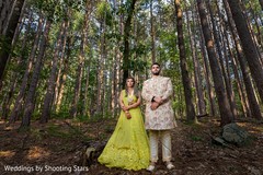Indian couple posing in the forest Indian couple posing in the forest