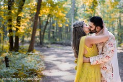 Indian couple kissing on the forest road Indian couple kissing on the forest road