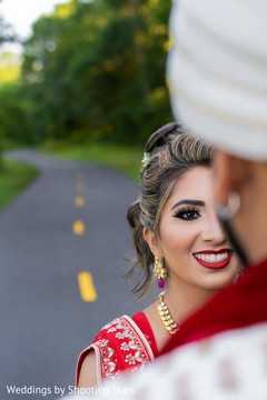 A close take of Maharani looking into her Indian groom's eyes A close take of Maharani looking into her Indian groom's eyes