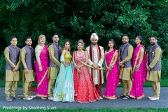 Indian couple posing with the Indian bridesmaids and Indian groomsmen Indian couple posing with the Indian bridesmaids and Indian groomsmen
