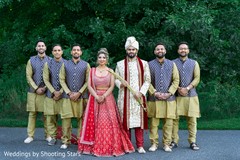 Indian couple posing with the Indian groomsmen Indian couple posing with the Indian groomsmen