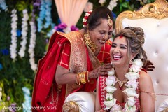 Maharani and her Indian relative laughing during the ceremony Maharani and her Indian relative laughing during the ceremony