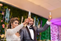 Indian newlyweds toasting Indian newlyweds toasting