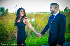 Indian newlywed couple walking at photo shoot Indian newlywed couple walking at photo shoot