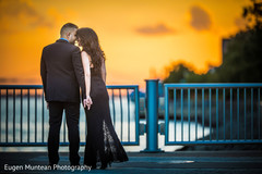 Indian couple looking at each other at sunset Indian couple looking at each other at sunset