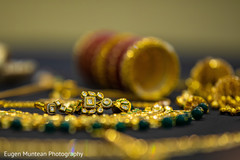 Gold with white and green stones Indian bridal earring. Gold with white and green stones Indian bridal earring.