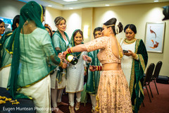 Indian bride with bridesmaids having a toast. Indian bride with bridesmaids having a toast.
