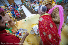 Indian bride and groom making offerings to Angi. Indian bride and groom making offerings to Angi.