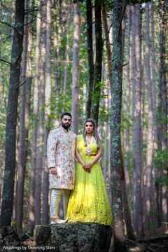 Indian couple posing at a forest Indian couple posing at a forest