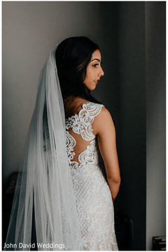 Indian birde wearing her white wedding ceremony veil. Indian birde wearing her white wedding ceremony veil.