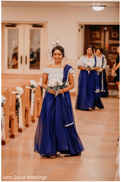 Indian bridemaid on her white and blue lehenga. Indian bridemaid on her white and blue lehenga.
