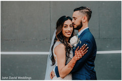Indian bride and groom hugging. Indian bride and groom hugging.