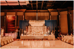 Ivory Indian wedding reception stage decorations. Ivory Indian wedding reception stage decorations.
