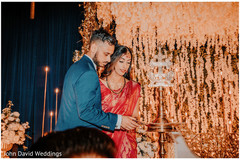 Indian birde and groom lighting up the sacred fire. Indian birde and groom lighting up the sacred fire.