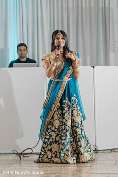 Indian bride speaking at reception Indian bride speaking at reception