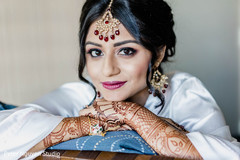 Indian bride with her hair and makeup done for ceremony. Indian bride with her hair and makeup done for ceremony.