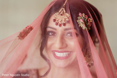 Indian bride with her red ghoonghat. Indian bride with her red ghoonghat.