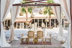 Golden and white indian wedding mandap decorations. Golden and white indian wedding mandap decorations.