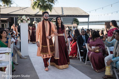 Indian bridesmaid and groomsmen walking down the aisle. Indian bridesmaid and groomsmen walking down the aisle.