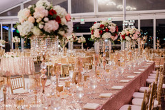 Golden Indian wedding reception rectangular table decoration. Golden Indian wedding reception rectangular table decoration.