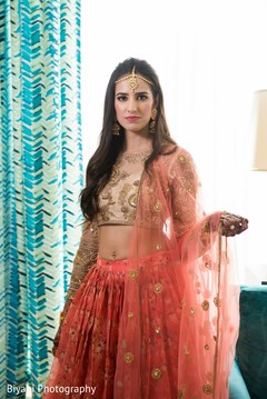 Indian bride with her pre-wedding outfit. Indian bride with her pre-wedding outfit.