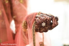 Indian bridal mehndi art and diamond engagement ring. Indian bridal mehndi art and diamond engagement ring.