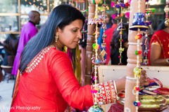 Indian Sangeet guest choosing favors. Indian Sangeet guest choosing favors.