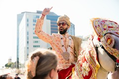 Indian groom riding his white baraat horse. Indian groom riding his white baraat horse.