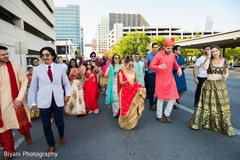 Indian wedding guests outdoors at baraat procession. Indian wedding guests outdoors at baraat procession.