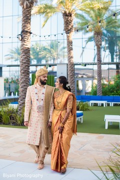 Indian couple walking outdoors. Indian couple walking outdoors.