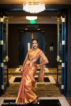 Maharani on her goldne and red Saree. Maharani on her goldne and red Saree.