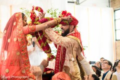 Indian couple during the jaimala ritual. Indian couple during the jaimala ritual.