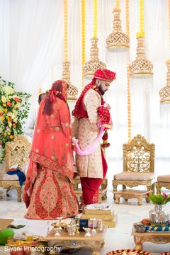 Indian bride and groom during the seven steps ritual. Indian bride and groom during the seven steps ritual.