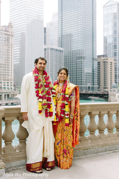 Indian bride and groom posing outdoors. Indian bride and groom posing outdoors.