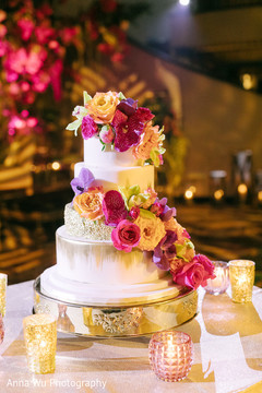 white and golden with roses Indian wedding cake . white and golden with roses Indian wedding cake .
