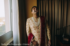 Indian groom's red dupata and kundan mala. Indian groom's red dupata and kundan mala.