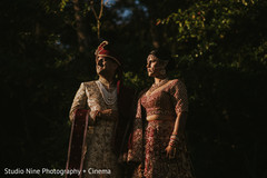 Indian couple in their ceremony red outfits. Indian couple in their ceremony red outfits.