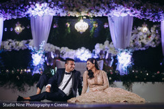 Indian couple posing for reception photo shoot. Indian couple posing for reception photo shoot.