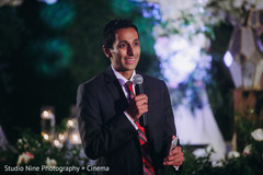 Indian groomsman at wedding reception speech. Indian groomsman at wedding reception speech.