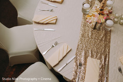 Ivory and golden indian wedding table decoration. Ivory and golden indian wedding table decoration.