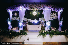 Indian wedding reception stage white and pink flowers decor. Indian wedding reception stage white and pink flowers decor.