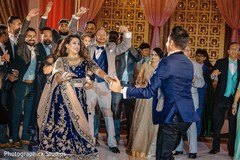 maharani and raja dancing at reception party. maharani and raja dancing at reception party.