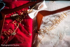Indian groom and bride's personalized hangers. Indian groom and bride's personalized hangers.
